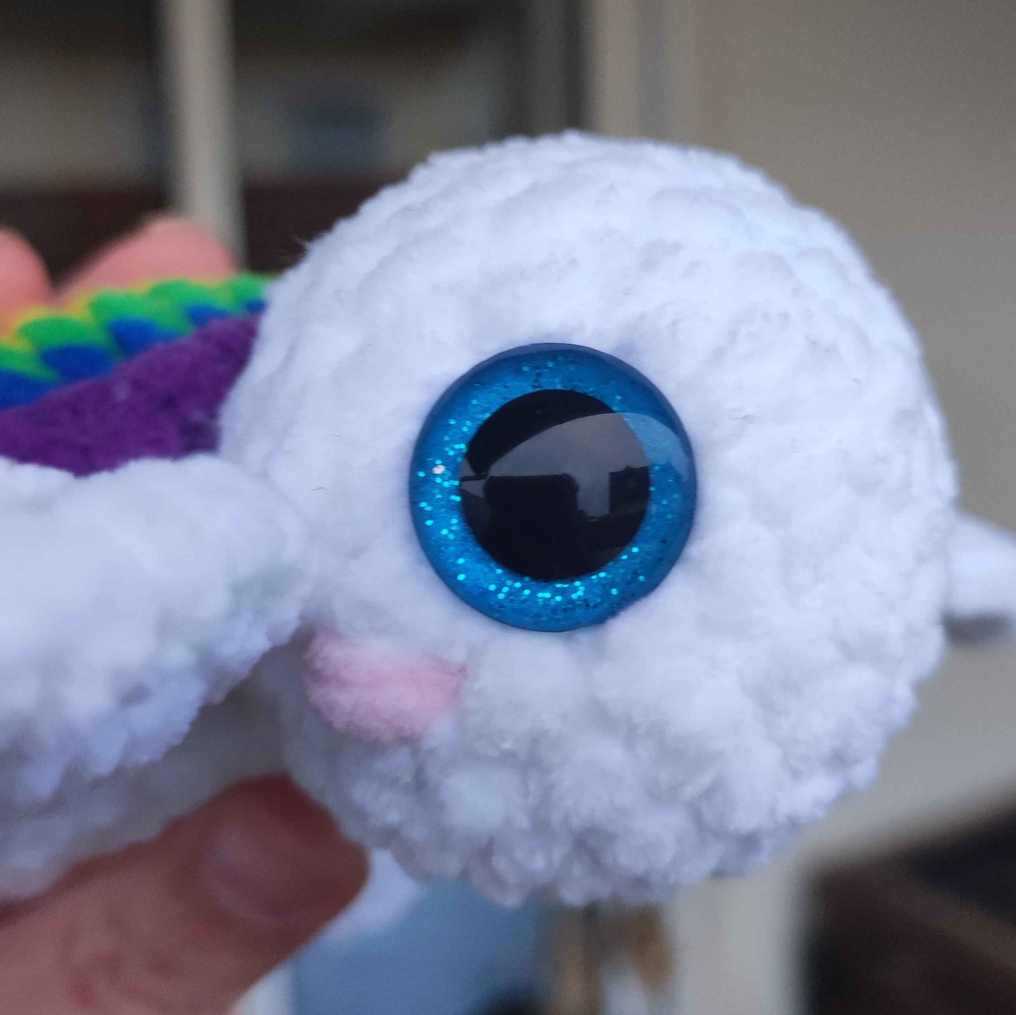 baby_schildkroete_kuscheltier_regenbogen_auge